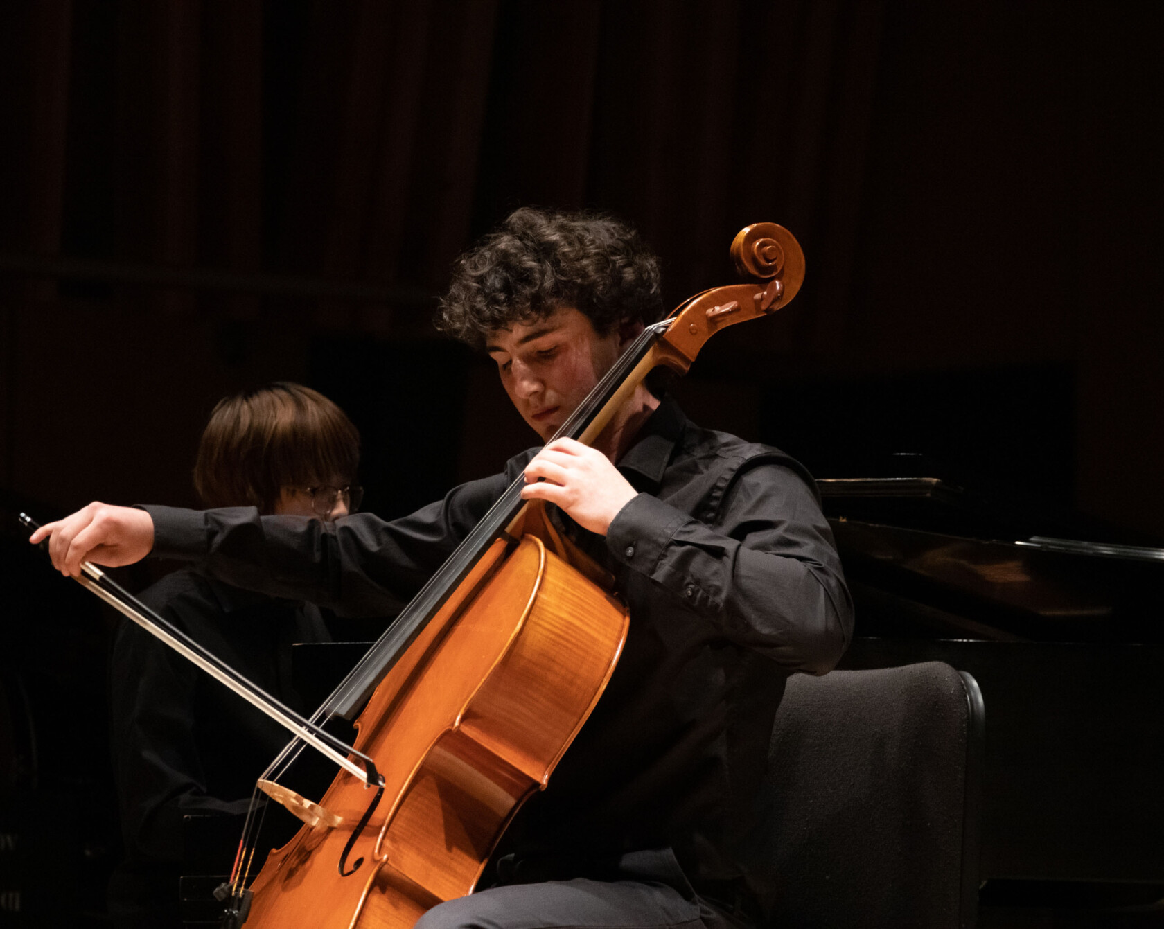 A cellist performing.