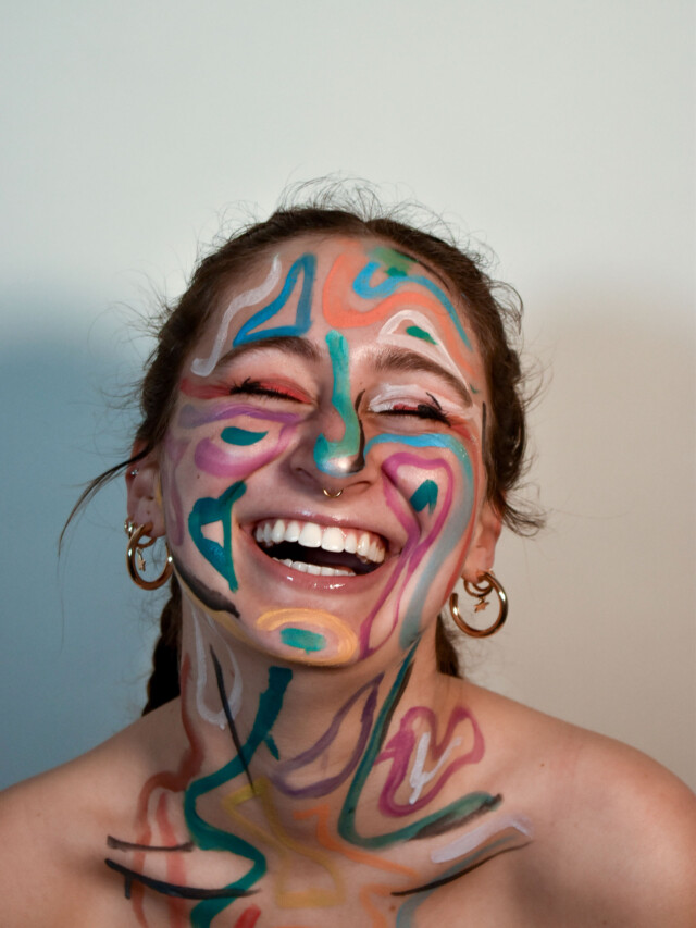 A student with colorful face paint.