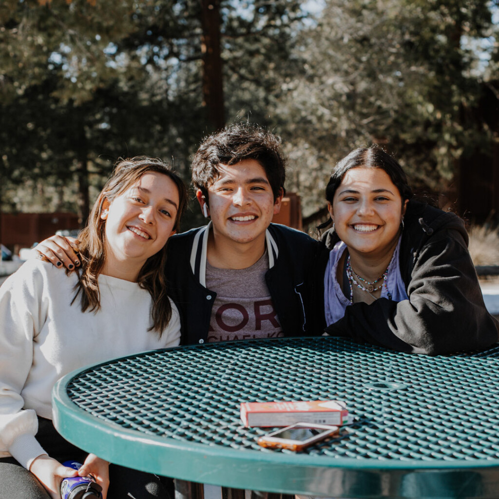 Three happy students.