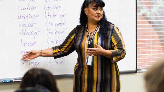 A faculty member teaching a Spanish class.